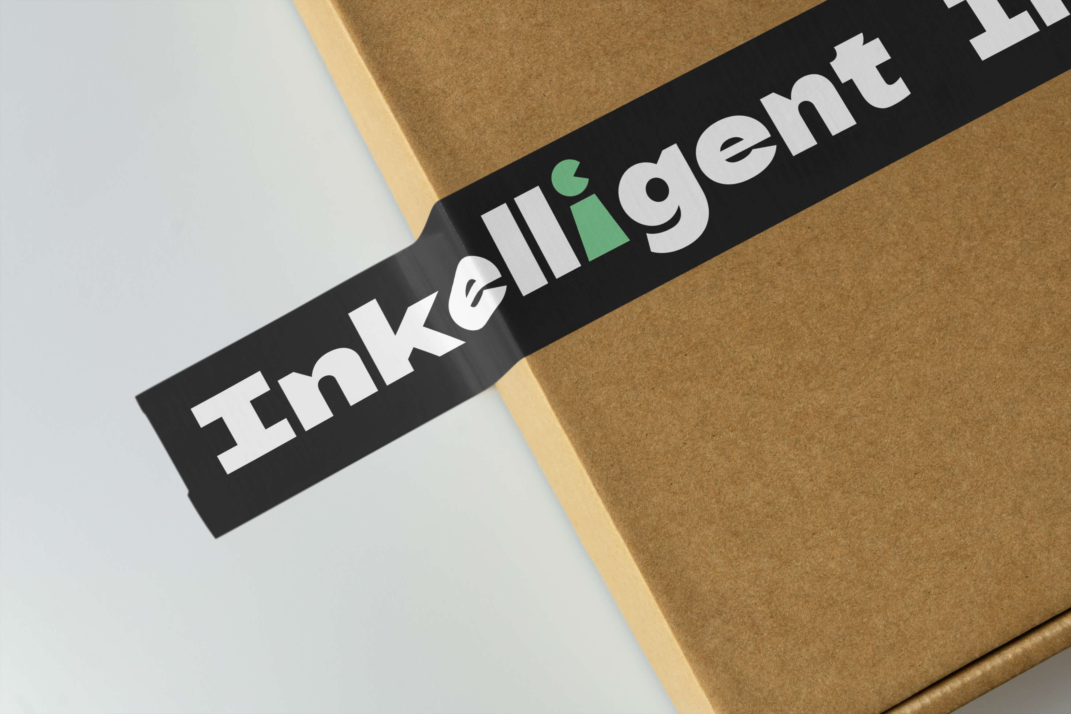 Brown box sealed with black tape featuring bold white and green text.